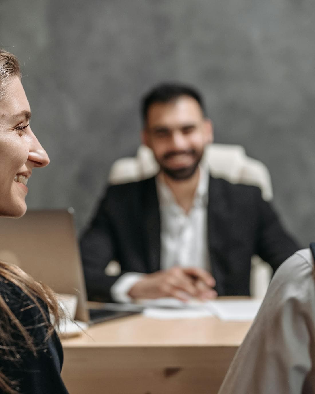 A senior leader in a client advisory conversation