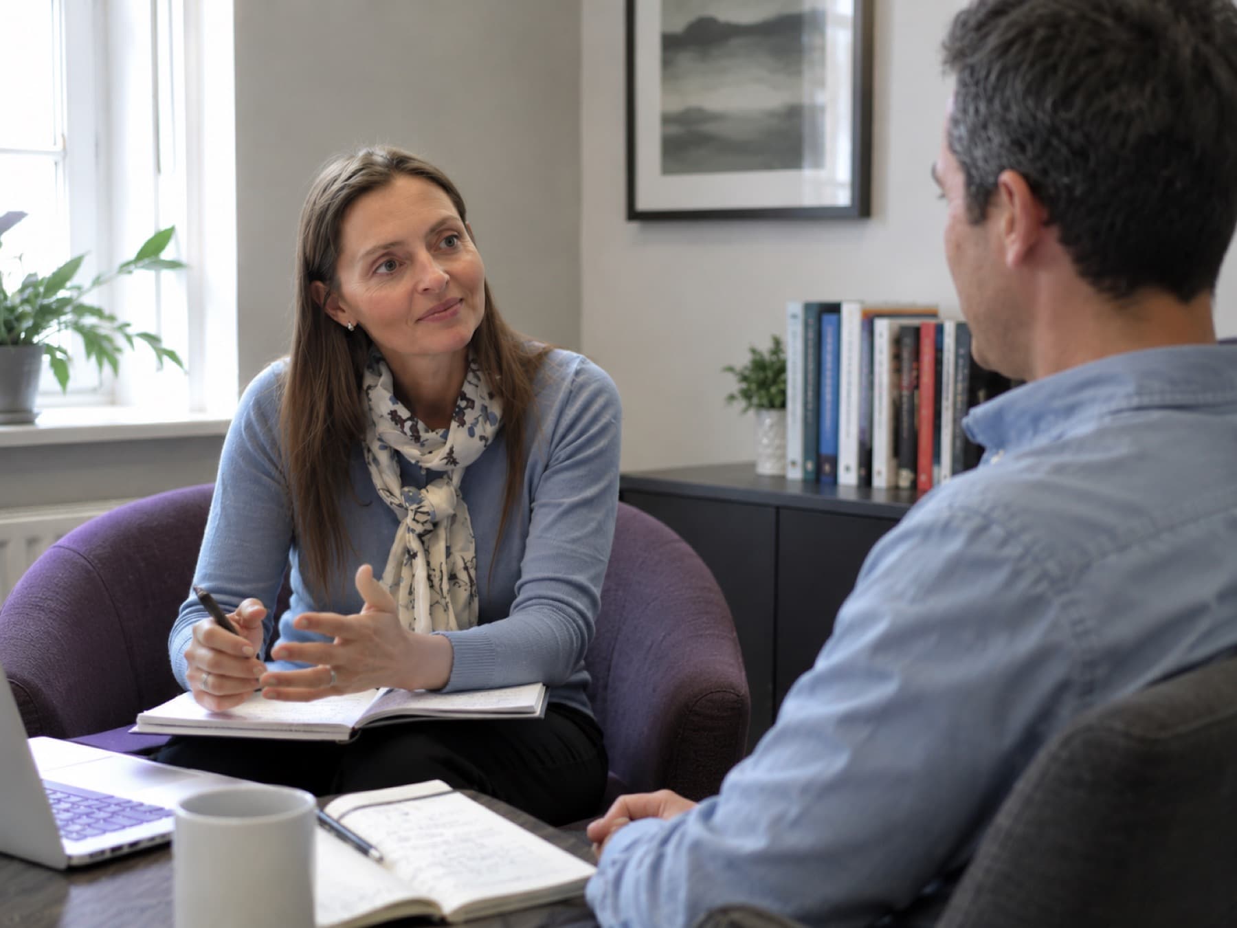Marie Willis in a one-to-one coaching conversation with a senior leader