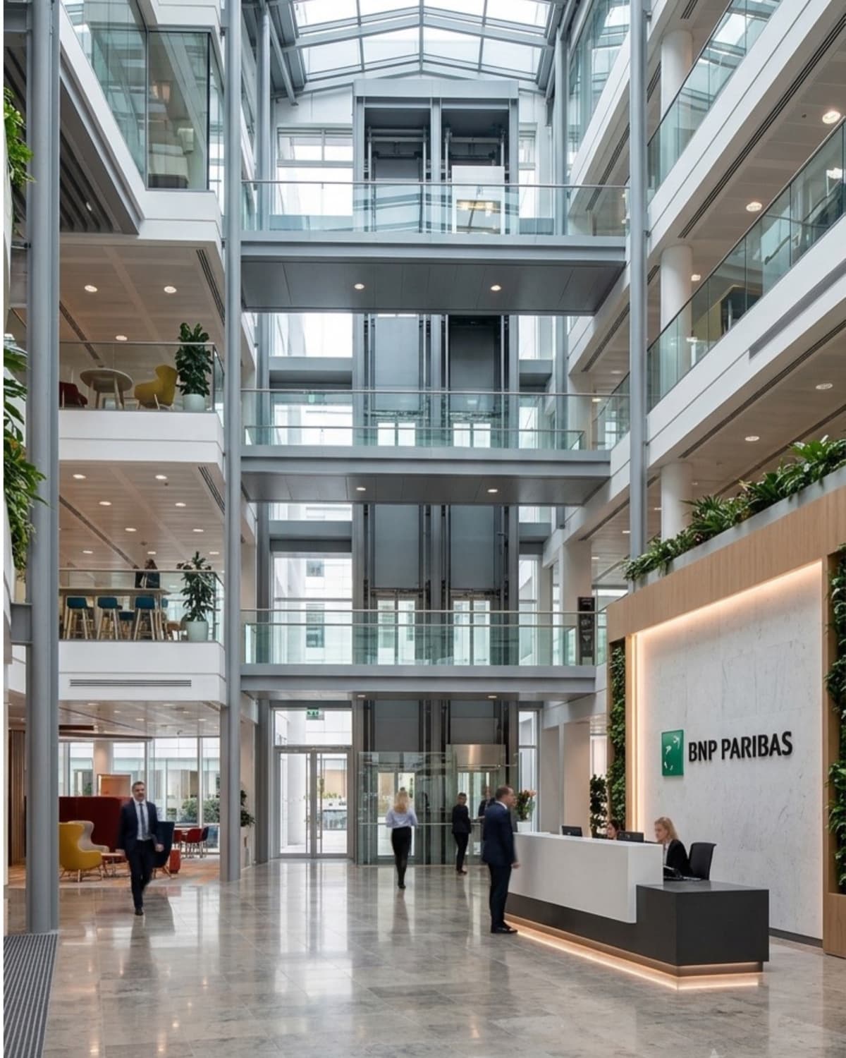 The atrium of a modern financial services headquarters